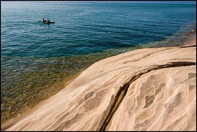 Kayakers paddling near Miners Beach on Lake Superior, Pictured Rocks National Lakeshore, Michigan