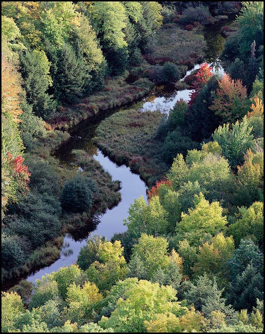 S curve in the Little Carp River surrounded by Fall foliage, near Lake of the Clouds, Upper Michigan, Fall